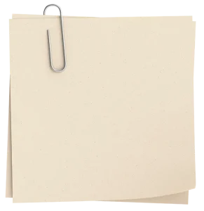 Two tan pieces of scrap paper held together by a paperclip